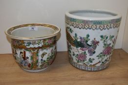 A 20th Century Chinese polychrome jardiniere decorated with dragon, exotic bird and flowering