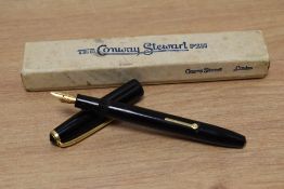 A boxed Conway Stewart 12 lever fill fountain pen in black having Conways stewart 14ct gold nib.