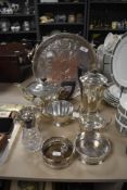 A selection of plated ware including a Mappin and Webb tea set, gallery tray, two wine coasters