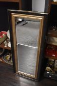A large contemporary rectangular bevelled mirror 45cm x 106cm approx.