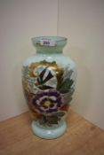 A Victorian aesthetic period mint green opaque glass vase with hand painted and gilded decoration.