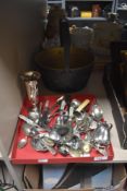 A brass jam pan and a collection of flatware and cutlery including loose tea diffuser, pickle