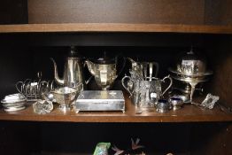 A selection of assorted plated ware including cigarette box, lighter, toast racks and coffee pots
