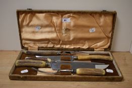 A mid-20th Century antler handled carving set by W.R. Humphreys & Co. with case