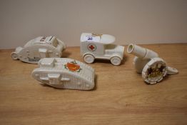 A group of WWI interest crested ware ornaments by Shelley, Arcadian, Waterfall, and Carlton,