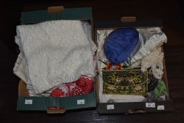 A small carton of linen tablecloths some having embroidery, two satin embroidered pillow shams and