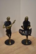 A pair of 20th century African (most likely Bennin) bronze musician figures with patinated