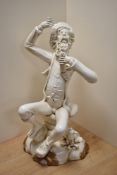 A 20th century Spanish Franju pottery figure, depicting a drunken tramp, impressed marks to