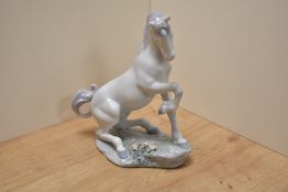 A Lladro 'Privalage' Magical Unicorn figure, number 7697, printed and moulded marks to underside