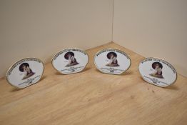 A group of four Royal Doulton bone china 'The 14th International Royal Doulton & Beswick