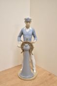 A Lladro porcelain figure, Yachtsman, 5206, modelled as a captain at the ships wheel, 34cm one