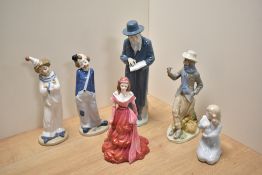 A group of mixed porcelain figures and figurines, comprising two Nadal porcelain clown figures, a