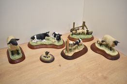 A group of six Border Fine Arts farm animal studies, comprising Suffolk ewe and lamb 119, Suffolk