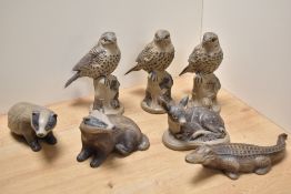 A group of seven Poole pottery stoneware animal and bird studies, comprising three thrushes, two