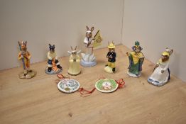 A group of seven Royal Doulton bone china 'Bunnykins' figures, various including England Athlete