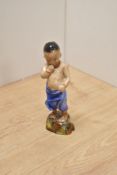A Royal Worcester bone china figure 'Burman' designed by F.G Doughty for the Children of the World