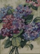 20th Century School, needlework, A bouquet of flowers, framed, mounted, and under glass, measuring