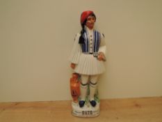 A Coronetti Metasca Ouzo Greek Dry Aperitif Decanter modelled as a Greek soldier standing, 90 proof,