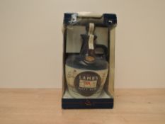 A ceramic Decanter containing Lamb's Navy Rum, 40% vol, 750ml, in display box