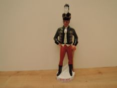 A Irish Mist Ireland's Legendary Liqueur Ceramic Decanter modelled as a soldier standing, 40% vol,