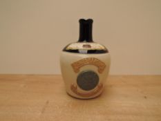 A William Whitely & Co Ceramic Flagon containing King's Ransom Blended Scotch Whisky, 26 2/3 Fl