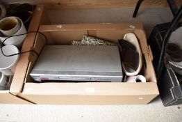 A Samsung DVD/VCD/CD/MP3 player, a small ceramic bedside table lamp, a metal money boxand a washable