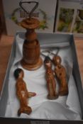 A group of four vintage novelty/risqué olive wood bottle openers