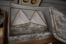 Three Ikea fabric storage boxes with lids.
