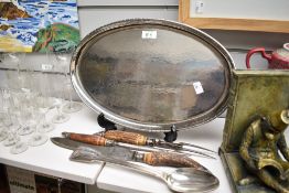 A silver plated horn carving set, two large serving spoons and a planished oval KSA style tray.