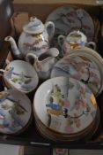 A selection of Japanese tea cups, saucers, tea pot, sugar basin and plates, having traditional