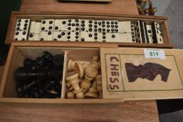 A vintage domino set and a set of chess players (1 missing).