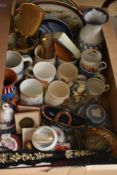 Two Royal Copenhagen Christmas plates 1986 and 1987, five commemorative ware mugs, a coin