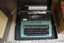 A vintage Silver-Reed 500 typewriter in solid case.