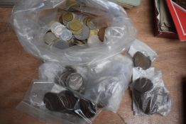 A bag containing a selection of assorted vintage and world coins.