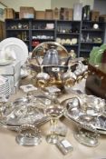 A selection of plated ware including a punch bowl having six matching cups, serving bowls, candle