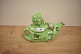 A vintage art deco Lingard english novelty ceramic teapot, depicting the old woman who lived in a