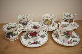 A set of six Royal Albert fruit cup and saucer sets, missing one saucer.