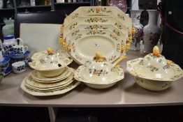 A Royal Doulton octagonal art dinner service having cheerful fruits and flowers design, comprising