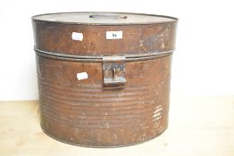 A Victorian tin hat box of oval form, measuring 33cm high