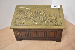 A vintage Jacob & Co biscuit box tin, depicting a farmhouse scene to lid.