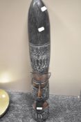 An African vintage carved handmade wall mask having metal decoration 82cm x 12cm.