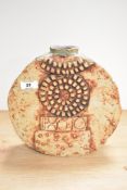 A mid-20th Century Troika style wheel vase, of brutalist design, measuring 26cm tall, showing some