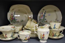 A Crown Staffordshire Art Deco design teaset, transfer printed and hand-decorated with polychrome