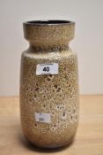 A West German pottery vase, with moulded neck and mottled brown glaze, marked W-Germany 242-22 to