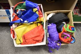 Two cartons of assorted kites and flags in used condition.