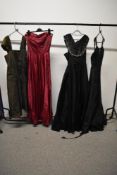 Four 1940s-1950s gowns, for repair or study.