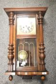 A Victorian mahogany cased regulator wall clock with brass coloured Arabic face, measuring 72cm tall