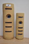 Two mid-20th Century stoneware vases, of cylindrical form and having stained glass decoration, the