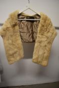 A vintage blonde mink stole.
