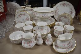 A Paragon 'Victoriana Rose' part dinner/tea service, including sandwich and cake plate, gravy boat